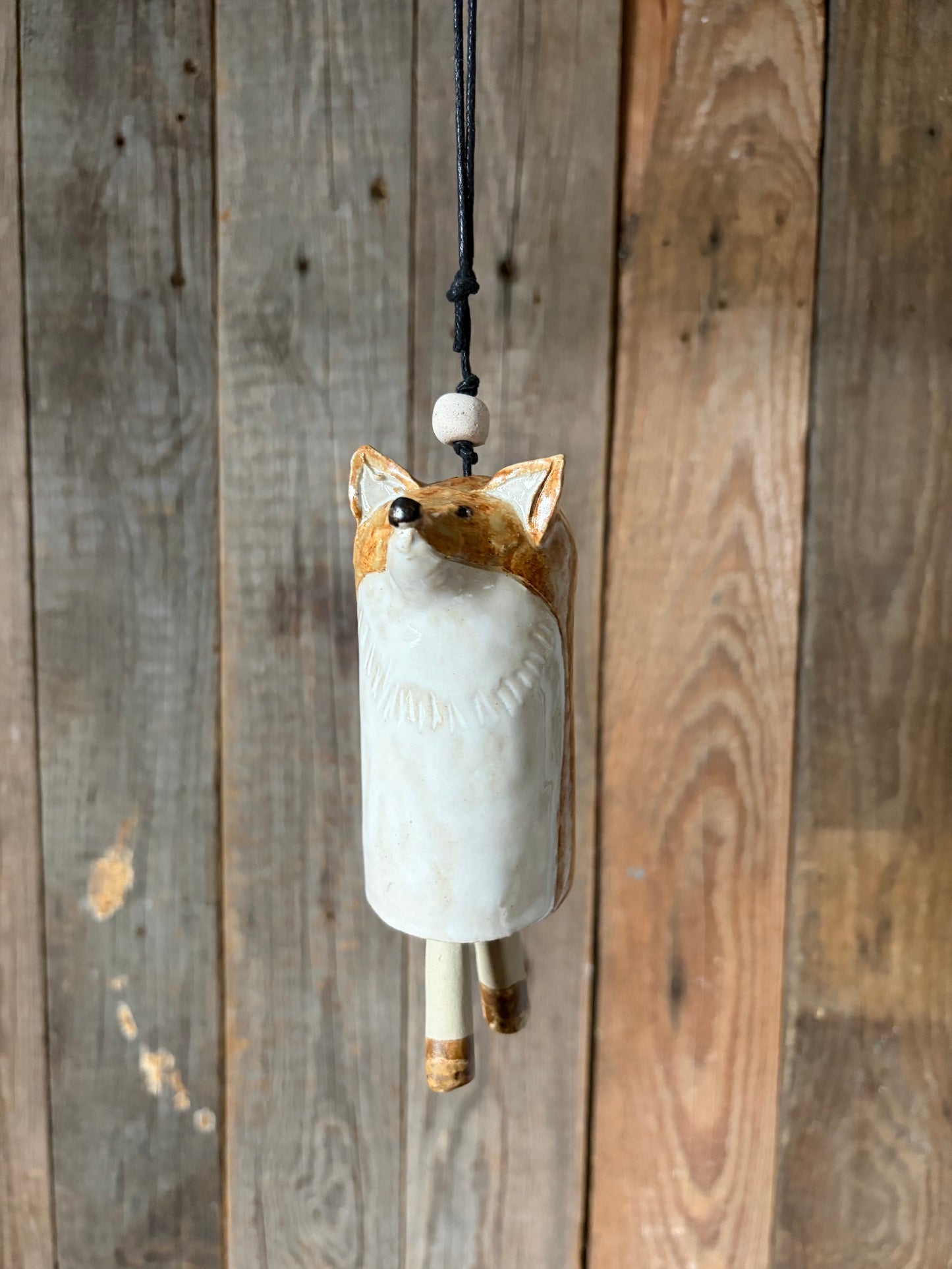 Una tintinnante campanella a forma di volpe del bosco