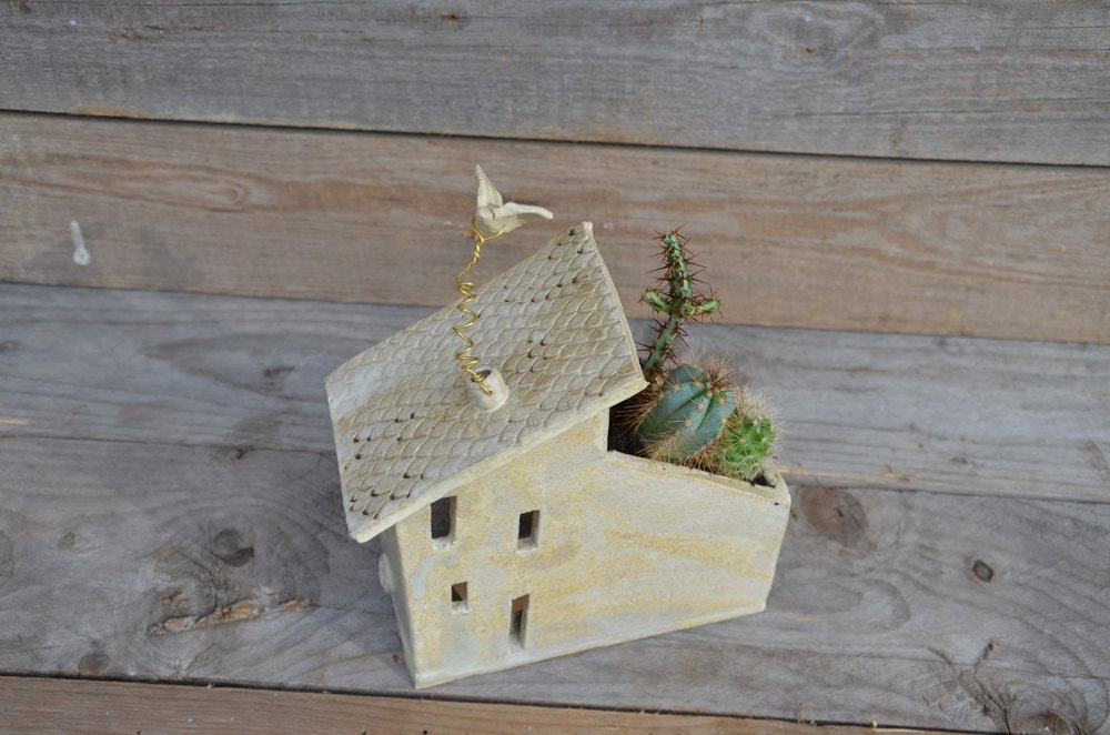 Casetta portacandela con porta pianta